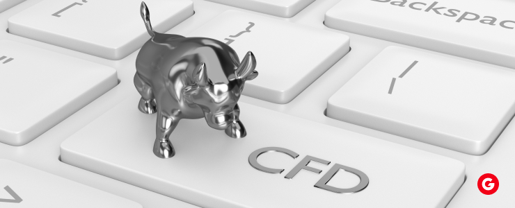 A bull sitting on a computer keyboard, symbolizing the concept of Multi-Asset CFD Portfolios.