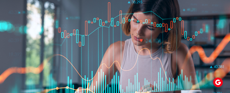 Trader studying forex market charts with MT4-style indicators overlaid on the screen